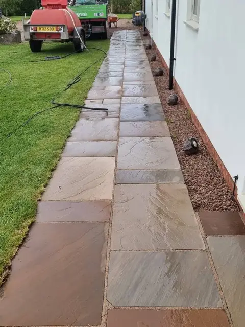 The same sandstone path after pressure washing